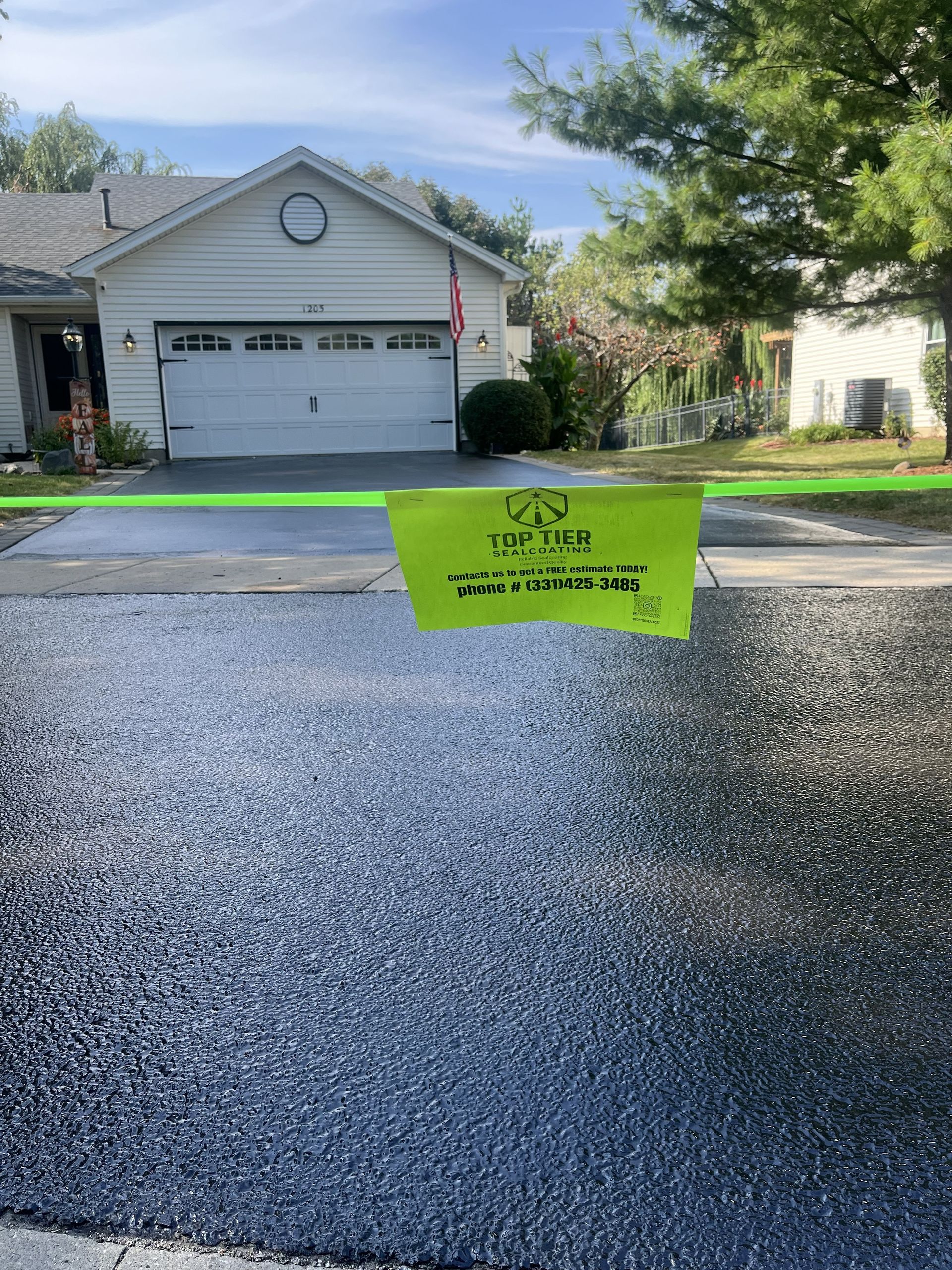 Freshly sealed asphalt driveway